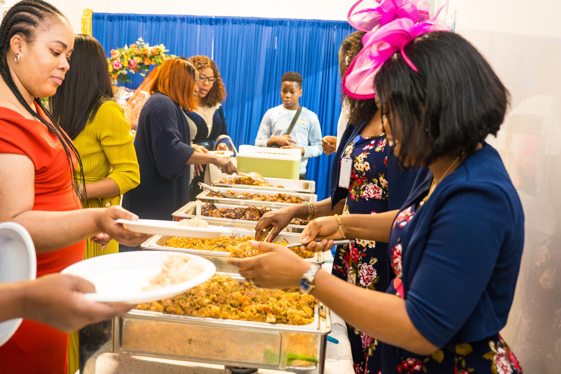 Members sharing a meal together after service