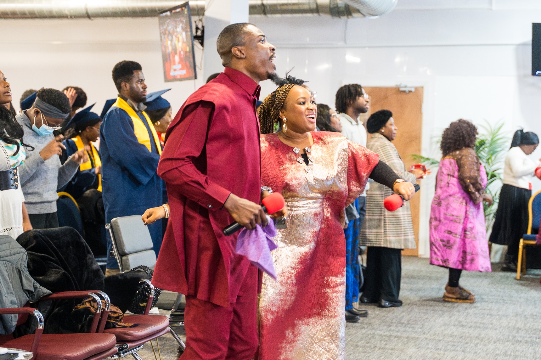 Couple worshipping joyfully in the congregation