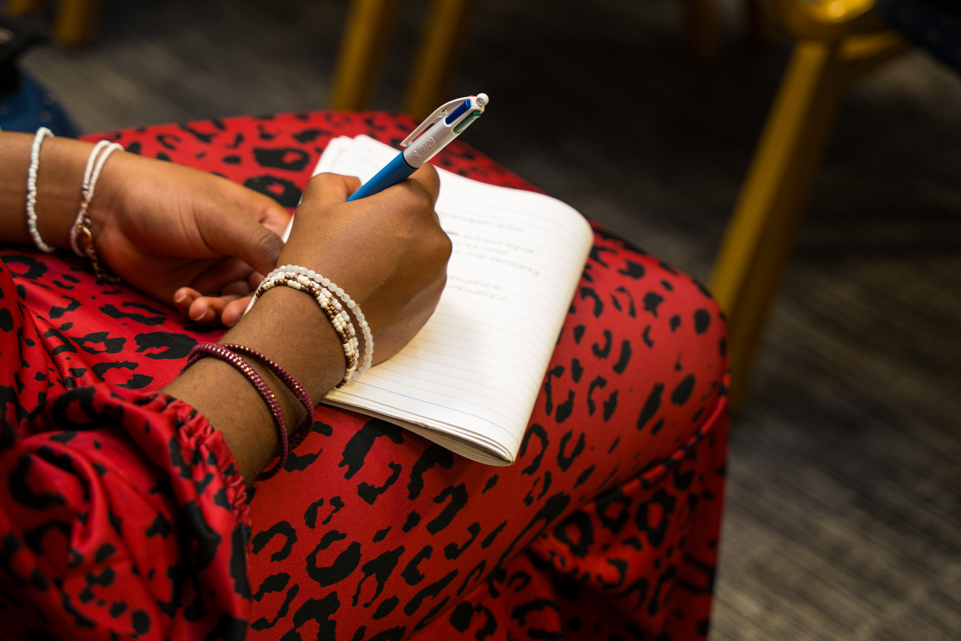 Church member taking notes during service