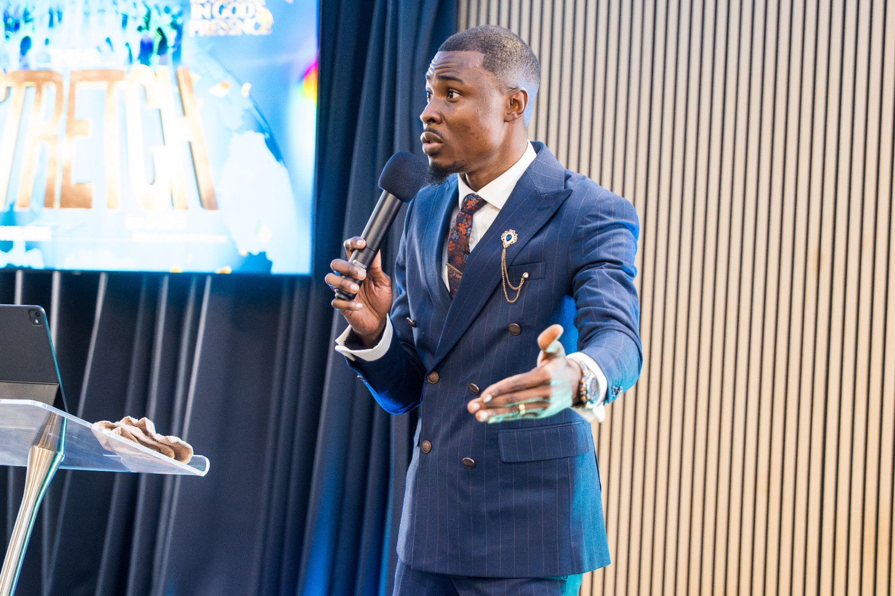 Minister preaching during Stretch in God's Presence