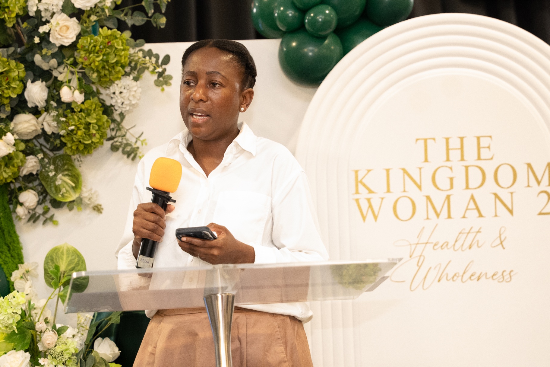 Speaker ministering at The Kingdom Woman 2 conference