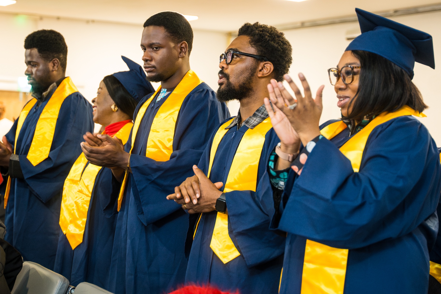 Maturity Class graduates applauding during celebration service