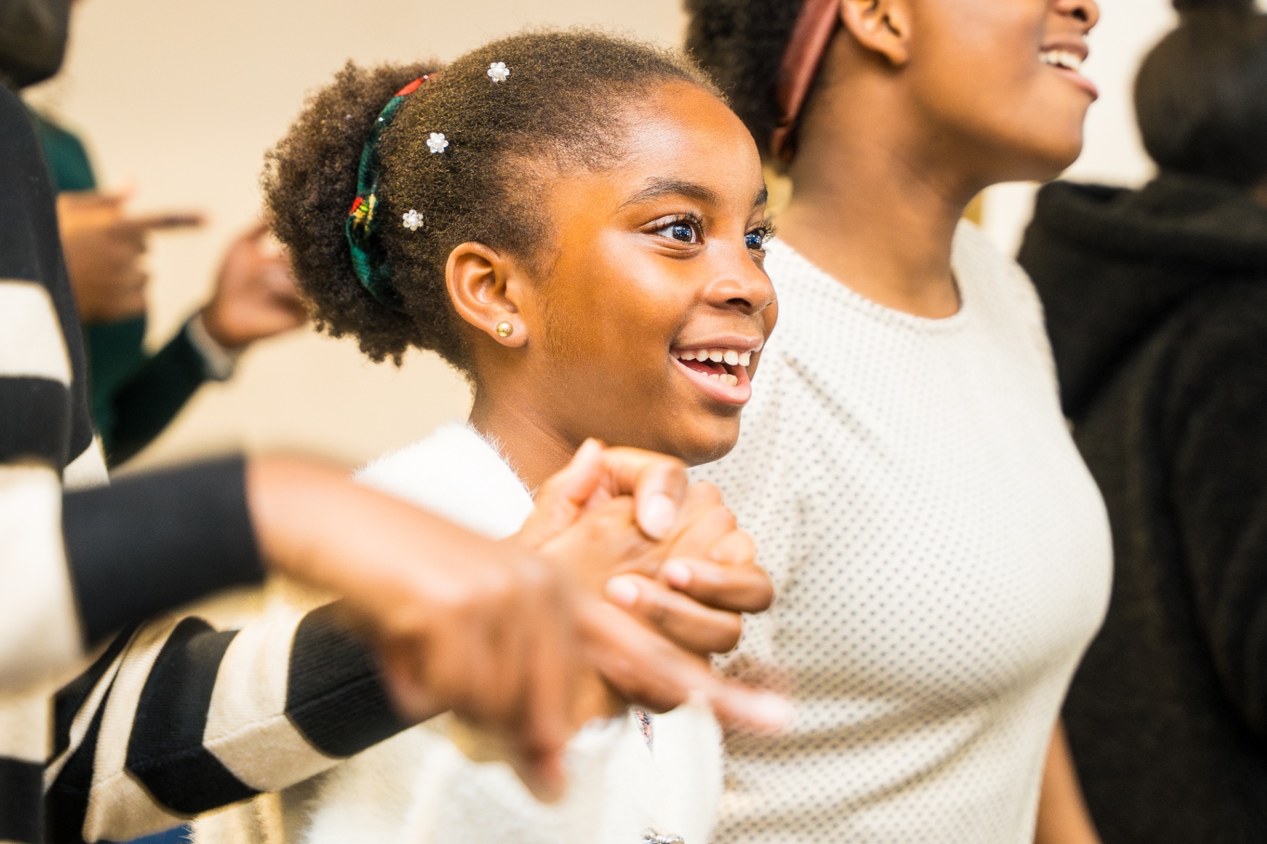 Joyful young girl during service